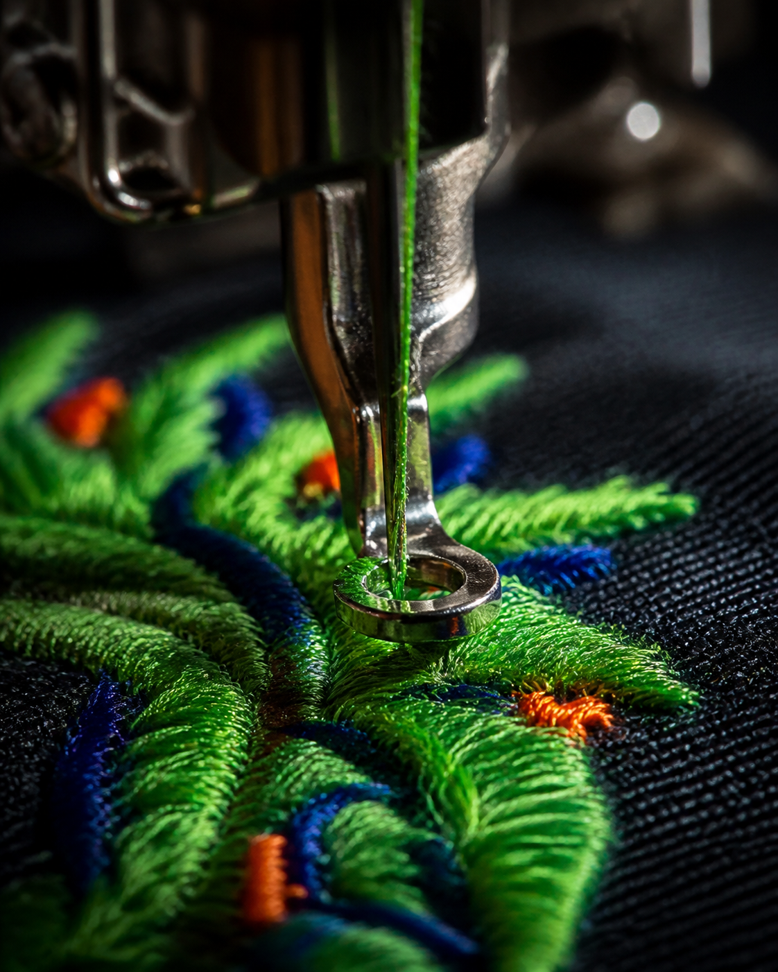 Embroidery machine stitching a colorful design